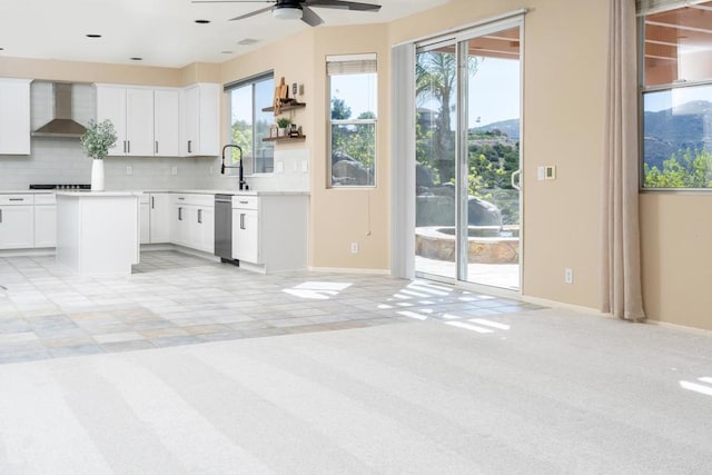 15881 Broad Oaks Rd, El Cajon, CA 92021 - kitchen with wall chimney range hood, ceiling fan, decorative backsplash, light countertops, and dishwasher