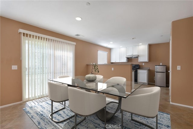 dining room featuring light tile patterned flooring, visible vents, recessed lighting, and baseboards