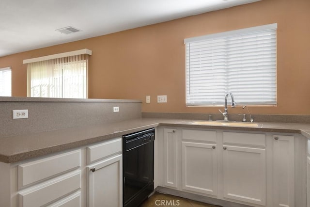 15793 Willow Dr, Fontana, CA 92337 - kitchen featuring black dishwasher and white cabinetry