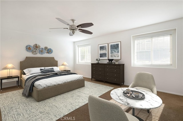 bedroom featuring baseboards, carpet floors, and ceiling fan