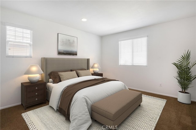bedroom featuring recessed lighting, baseboards, multiple windows, and carpet floors