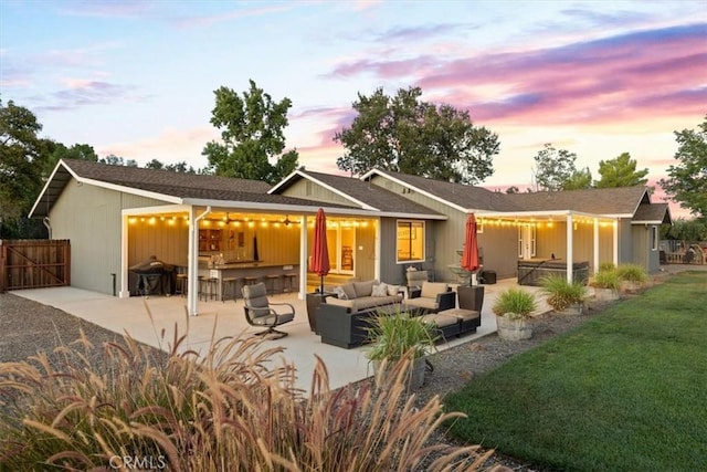 25050 Massachussetts Ave, Corning, CA 96021 - back of property featuring outdoor lounge area and a patio