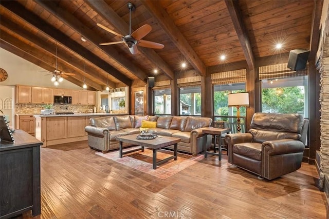 25050 Massachussetts Ave, Corning, CA 96021 - living room with a wooden ceiling with exposed beams, ceiling fan, light wood-style floors, and high vaulted ceiling