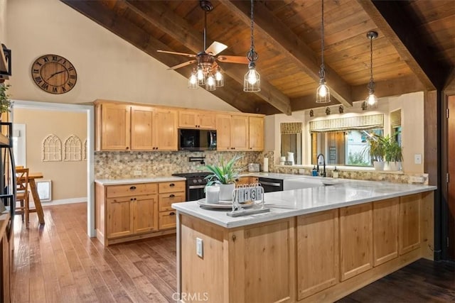 25050 Massachussetts Ave, Corning, CA 96021 - kitchen with black microwave, wood ceiling, light brown cabinets, stainless steel gas range oven, and wood-type flooring