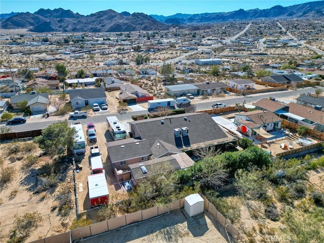 drone / aerial view featuring a mountain view and a residential view