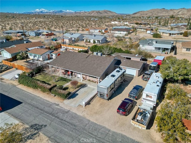 aerial view with a residential view and a mountain view