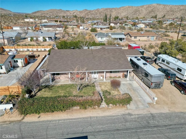 bird's eye view featuring a mountain view and a residential view