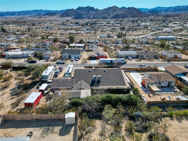 bird's eye view with a residential view and a mountain view
