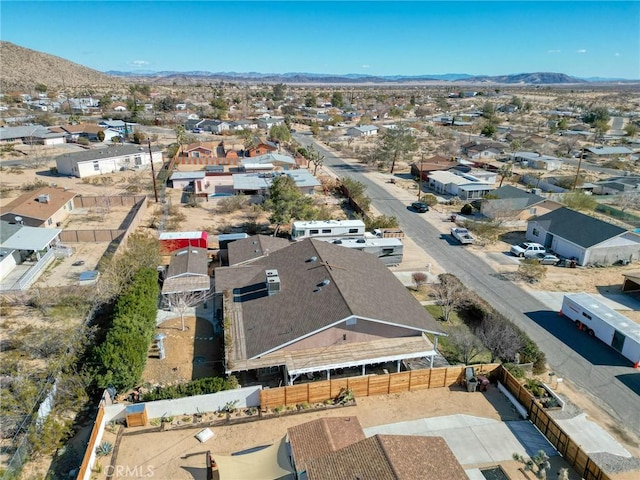 drone / aerial view with a residential view and a mountain view