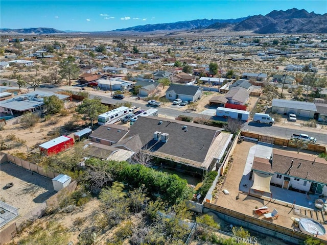 aerial view with a mountain view and a residential view
