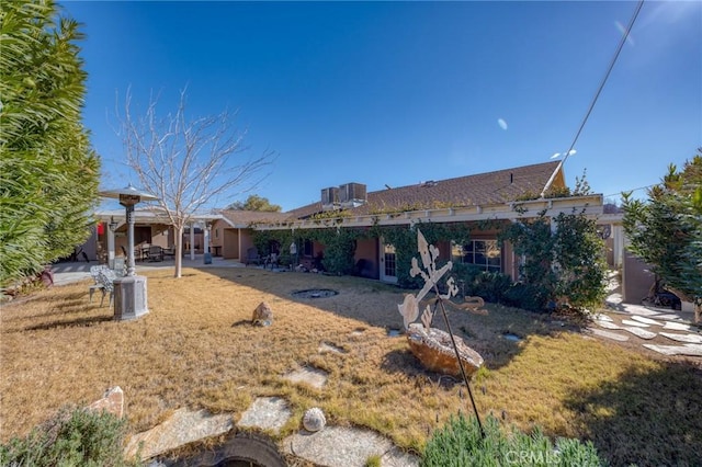 rear view of house with a patio area