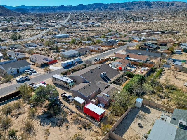 aerial view featuring a mountain view and a residential view