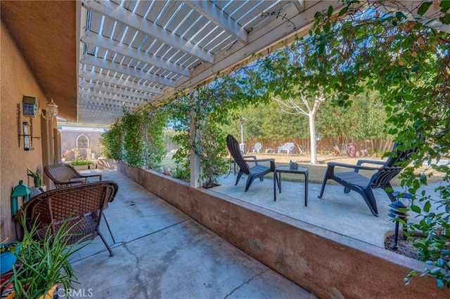 view of patio featuring a fenced backyard and a pergola