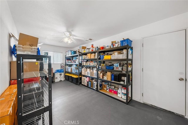 storage area with a ceiling fan