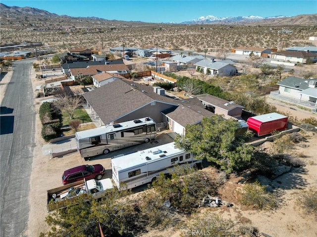 birds eye view of property featuring a residential view and a mountain view