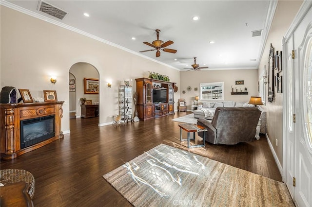 6116 Panorama St, Joshua Tree, CA 92252 - living area featuring recessed lighting, a ceiling fan, arched walkways, wood finished floors, and a glass covered fireplace
