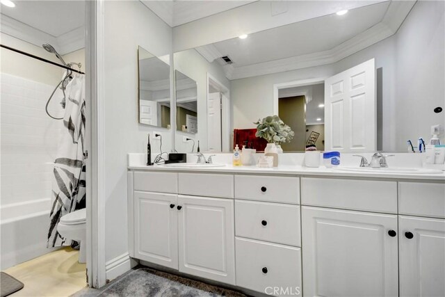 8345 Sunshine Ln, Riverside, CA 92508 - bathroom with double vanity, toilet, crown molding, and a sink