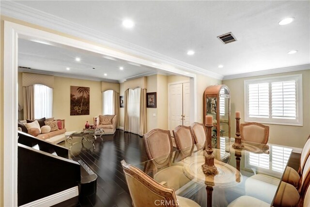 8345 Sunshine Ln, Riverside, CA 92508 - dining room featuring recessed lighting, arched walkways, wood finished floors, and crown molding