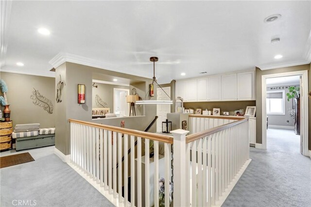8345 Sunshine Ln, Riverside, CA 92508 - hallway with crown molding, an upstairs landing, light colored carpet, and baseboards