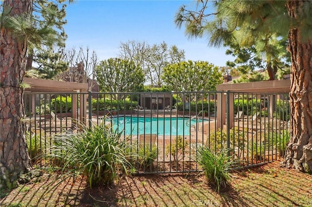 community pool featuring fence
