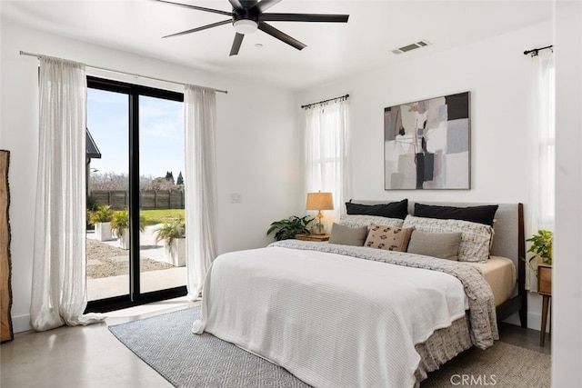 bedroom with access to exterior, visible vents, and ceiling fan