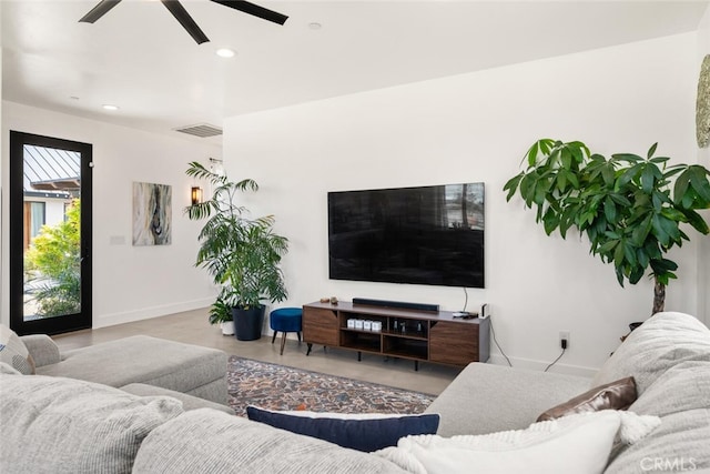 living area with baseboards, visible vents, recessed lighting, and a ceiling fan