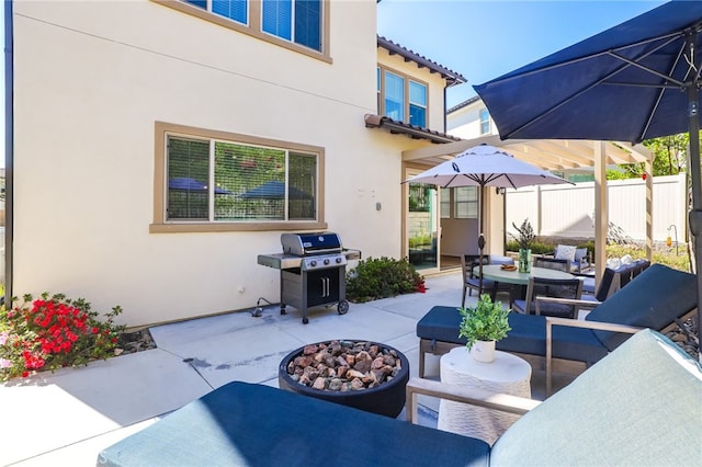 1711 Sonora Creek Ln, Lake Forest, CA 92610 - view of patio with area for grilling, fence, an outdoor fire pit, and outdoor dining space