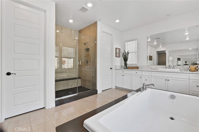 1711 Sonora Creek Ln, Lake Forest, CA 92610 - bathroom featuring visible vents, a soaking tub, a shower stall, vanity, and tile patterned floors