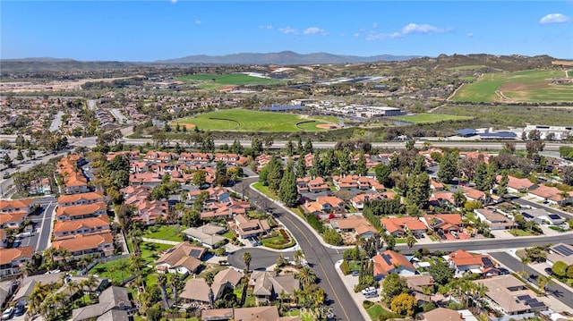 5649 Roane Dr, Oceanside, CA 92057 - aerial view of property and surrounding area with a golf club, nearby suburban area, and mountains