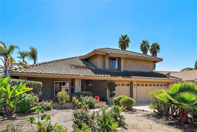 5649 Roane Dr, Oceanside, CA 92057 - view of front of house with a tiled roof and concrete driveway