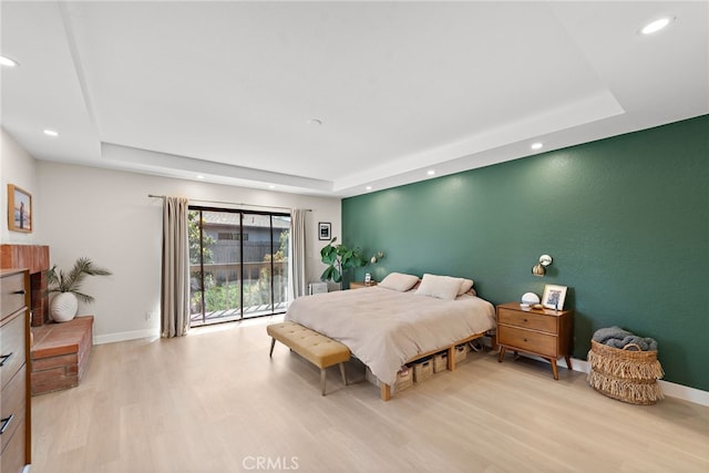 5649 Roane Dr, Oceanside, CA 92057 - bedroom with a tray ceiling, light wood-type flooring, recessed lighting, and baseboards
