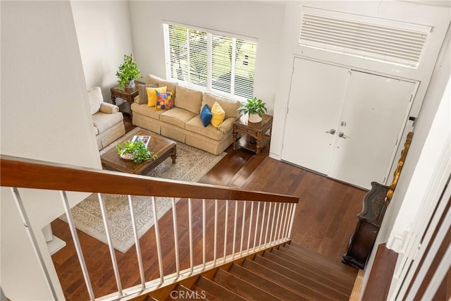 interior space with hardwood / wood-style floors and stairs