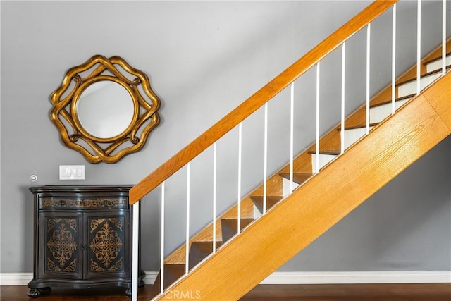 stairway with baseboards