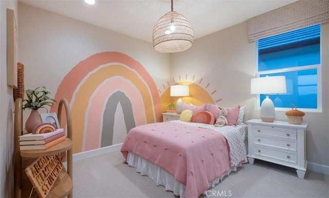 carpeted bedroom with baseboards