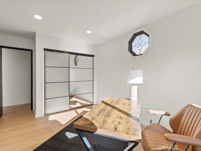 home office with recessed lighting and wood finished floors