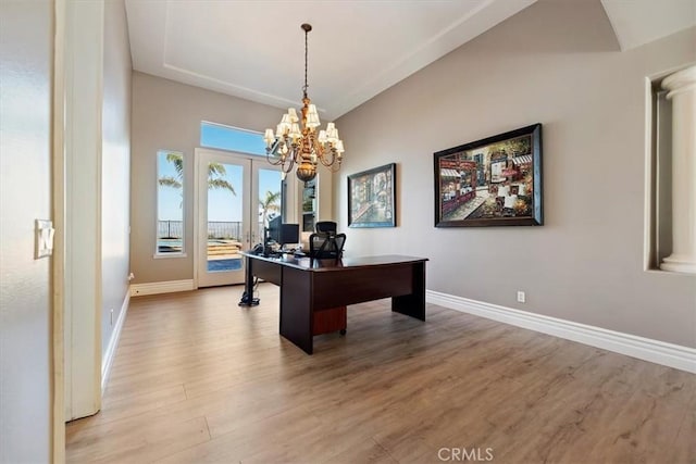 4195 Robby Cir, Corona, CA 92881 - office space with baseboards, wood finished floors, and a chandelier