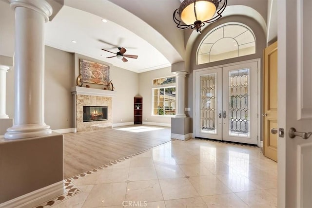 4195 Robby Cir, Corona, CA 92881 - entryway with decorative columns, french doors, ceiling fan, arched walkways, and baseboards