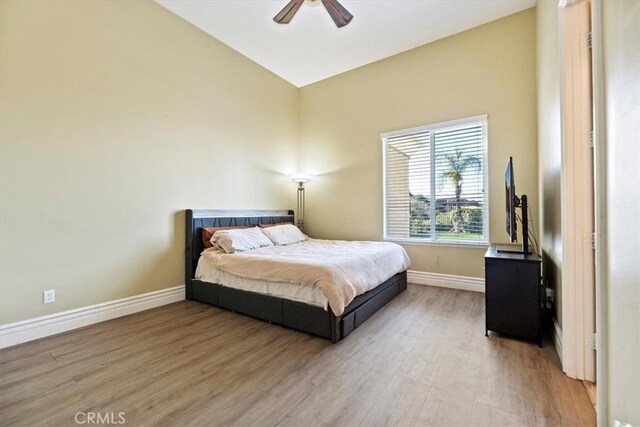 4195 Robby Cir, Corona, CA 92881 - bedroom featuring wood finished floors, baseboards, lofted ceiling, and a ceiling fan