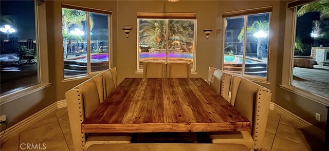 4195 Robby Cir, Corona, CA 92881 - unfurnished dining area with tile patterned floors and baseboards