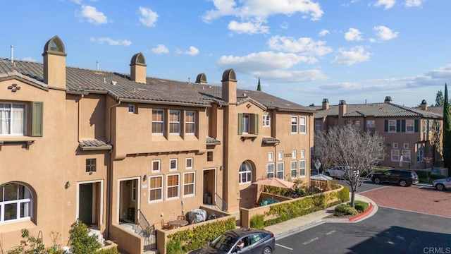 13325 Via Constanza Unit 2, San Diego, CA 92129 - view of property featuring uncovered parking and a residential view