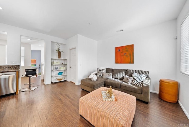 13325 Via Constanza Unit 2, San Diego, CA 92129 - living area featuring dark wood-type flooring and baseboards