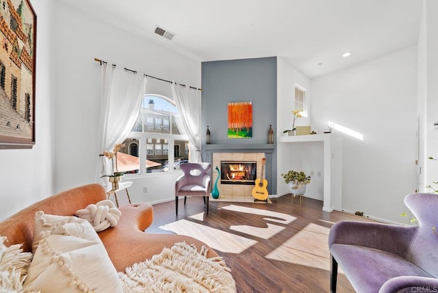 13325 Via Constanza Unit 2, San Diego, CA 92129 - living area featuring a tile fireplace, wood finished floors, and recessed lighting