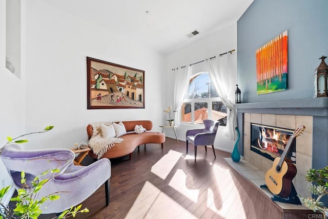 13325 Via Constanza Unit 2, San Diego, CA 92129 - living room with a tiled fireplace and wood finished floors