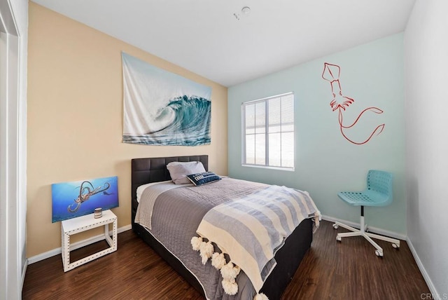 13325 Via Constanza Unit 2, San Diego, CA 92129 - bedroom with baseboards and wood finished floors