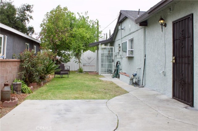 323 E Hanna St, Colton, CA 92324 - view of yard with a patio and fence