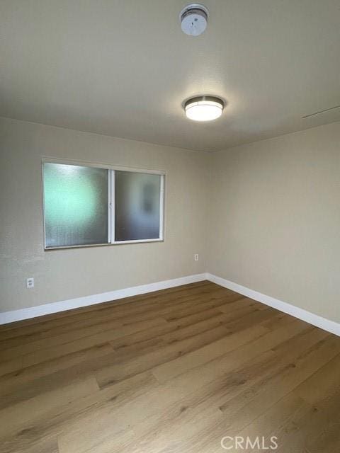 9286 San Benito Ave, Gerber, CA 96035 - unfurnished room with baseboards and wood finished floors