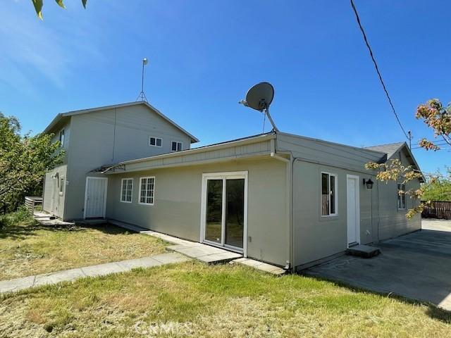 9286 San Benito Ave, Gerber, CA 96035 - rear view of house with a patio and a yard
