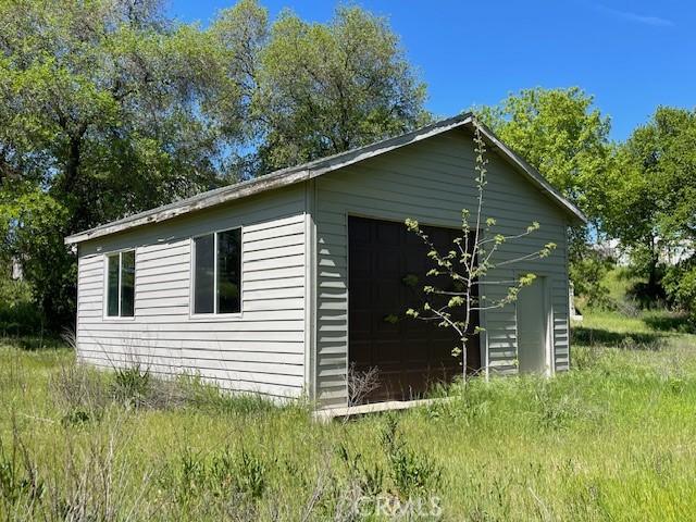 9286 San Benito Ave, Gerber, CA 96035 - view of side of home featuring an outbuilding and a detached garage