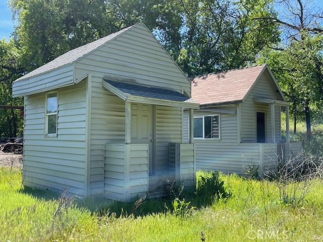 9286 San Benito Ave, Gerber, CA 96035 - view of front facade with an outbuilding and roof with shingles
