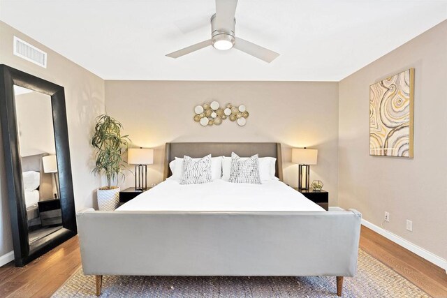 1631 Neptune Ave, Encinitas, CA 92024 - bedroom with wood finished floors, baseboards, and a ceiling fan